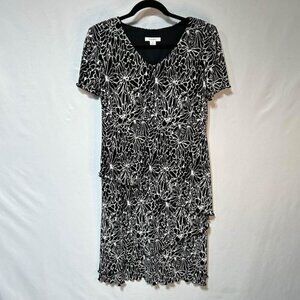 Woman’s tiered, lined dress. Black and white. Crinkle material. Size 8. New cond